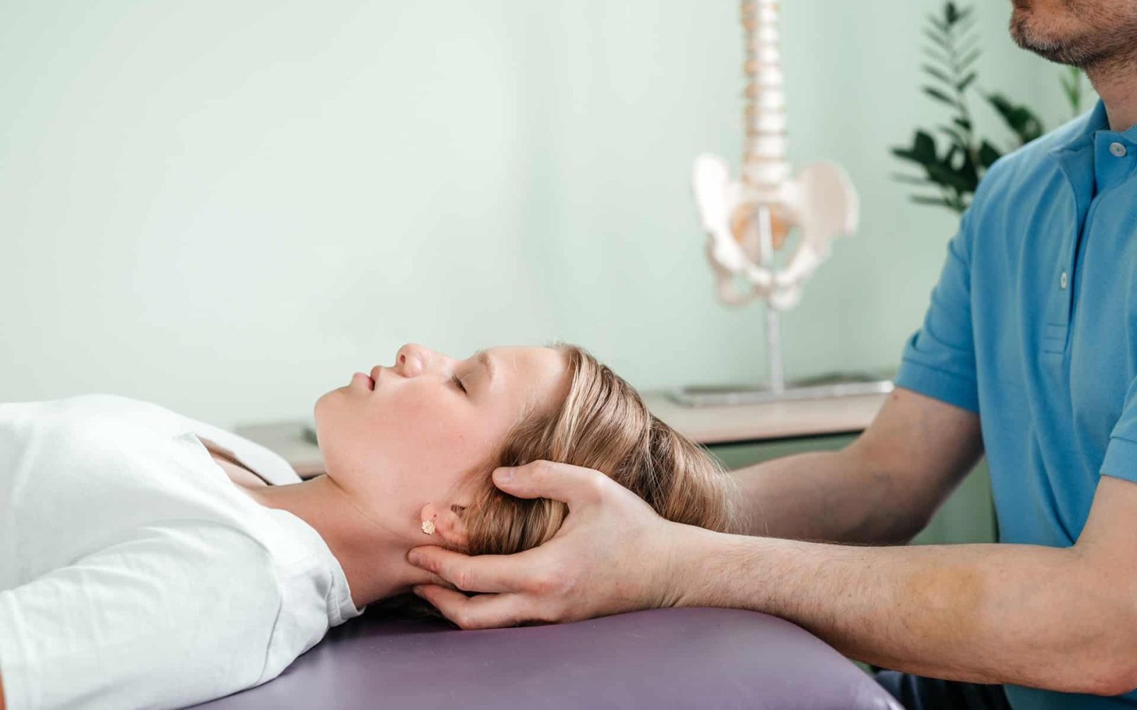 a girl receiving cst treatment by osteopath practi 2023 11 27 05 03 44 utc