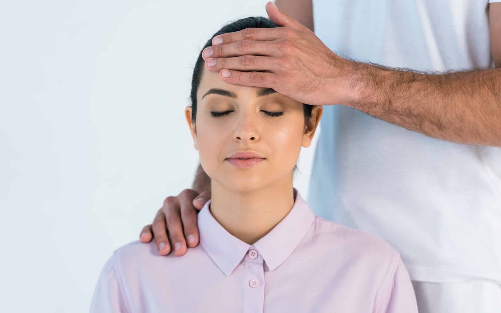cropped view of healer putting hand on head of att 2023 11 27 05 28 25 utc