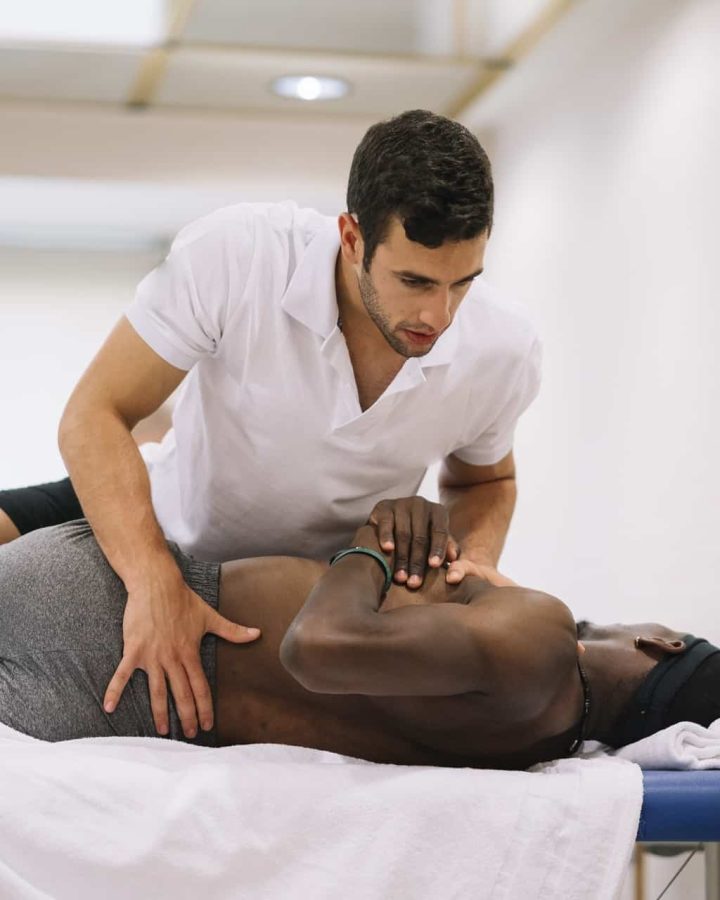the physiotherapist treating a man using equipment 2023 11 27 05 04 56 utc
